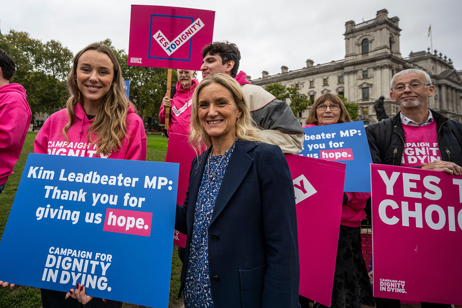 Labour MP Kim Leadbeater poses with assisted dying campaigners