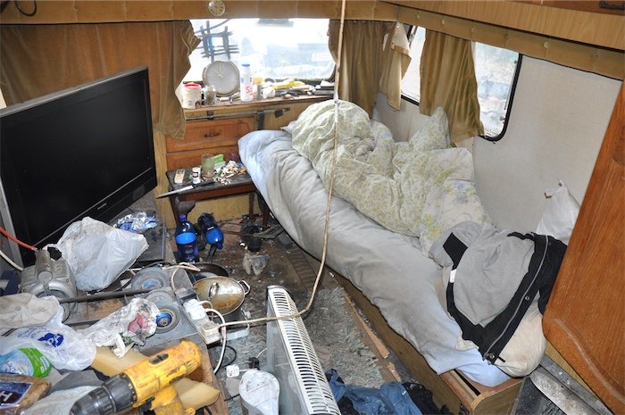 Undated handout photo issued by Lincolnshire Police of a caravan which men were forced to live in by the Rooneys, as members of the traveller family have been jailed for running a modern slavery ring.